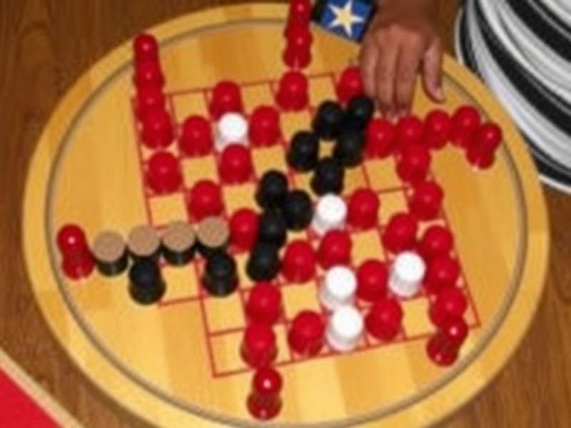 Chinese Checkers board setup with colorful marbles