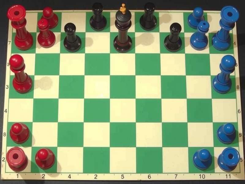 Classic checkers board with red and black pieces arranged for a new game